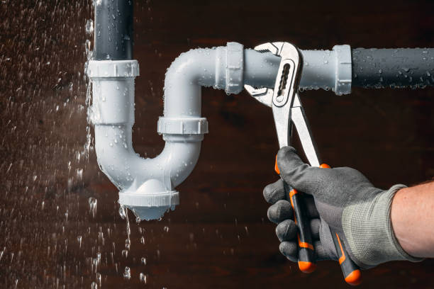 Professional Emergency Plumber technician working in Bringhurst, IN